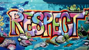 Mural con un gaffiti que dice "Respect"
